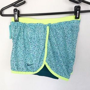 | Nike | layered bright running shorts